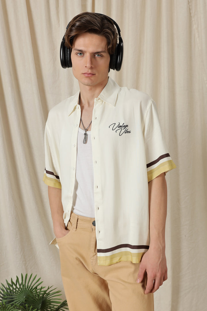 Vintage Vibes: Cream oversized shirt