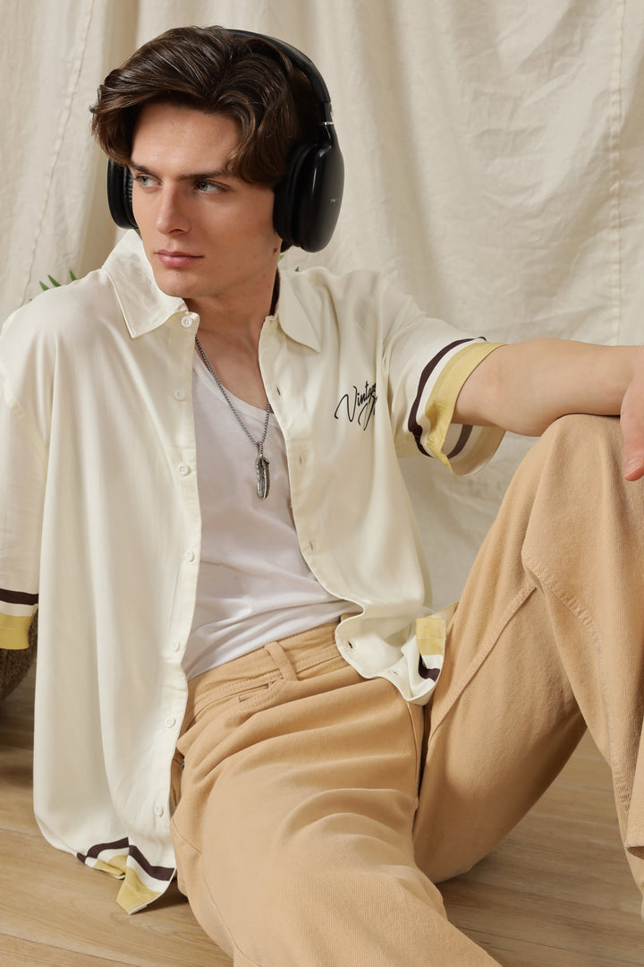 Vintage Vibes: Cream oversized shirt