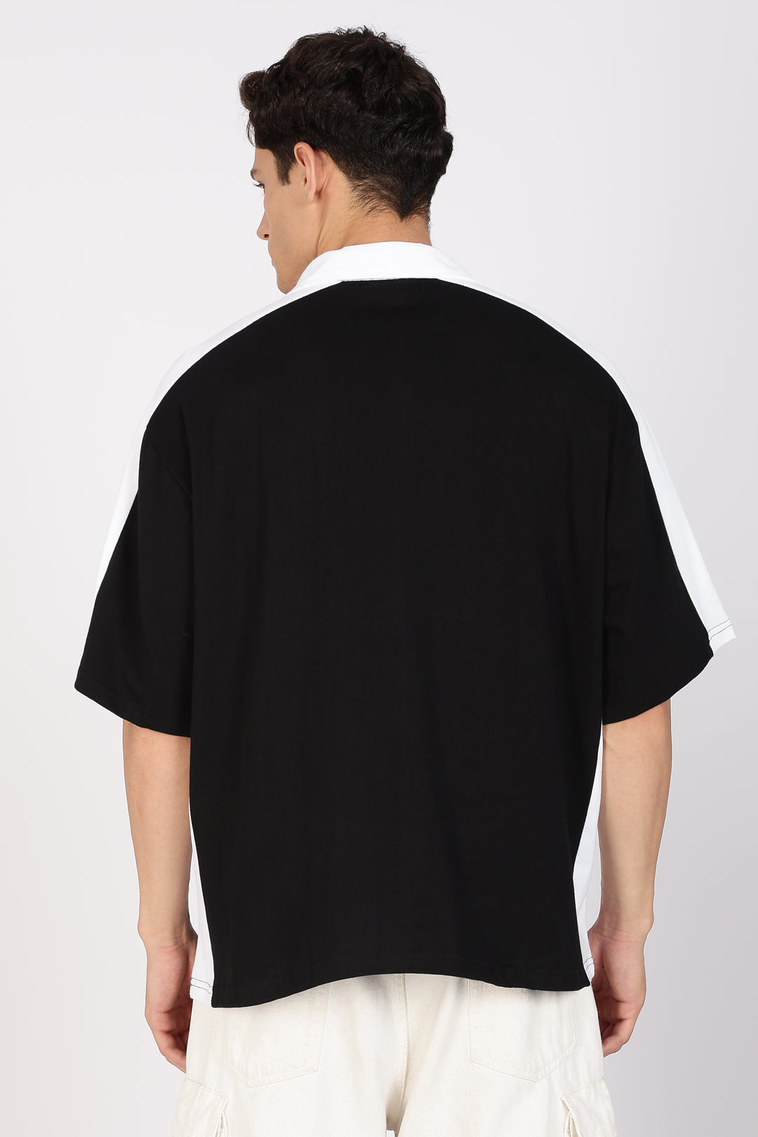 Retrograde: Black and White Oversized Polo